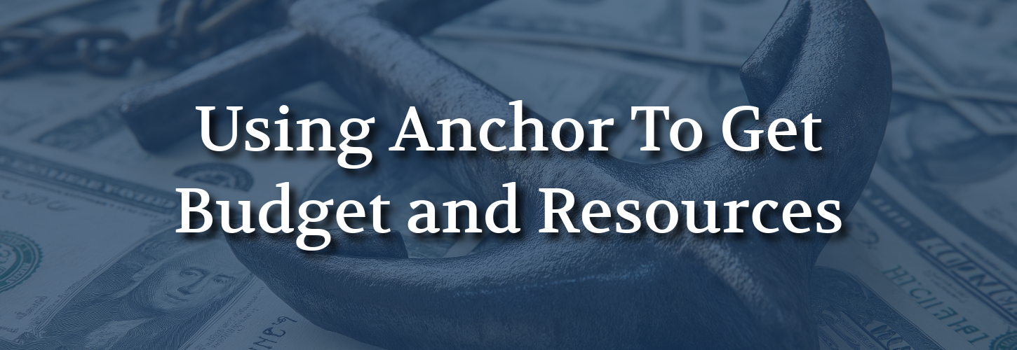 A large anchor rests on scattered dollar bills in the background. The text reads "Using Anchor To Get Budget and Resources," suggesting financial strategy.