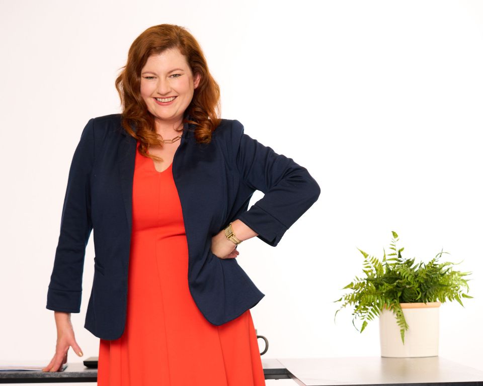 Kristy Grant-Hart Standing at a desk