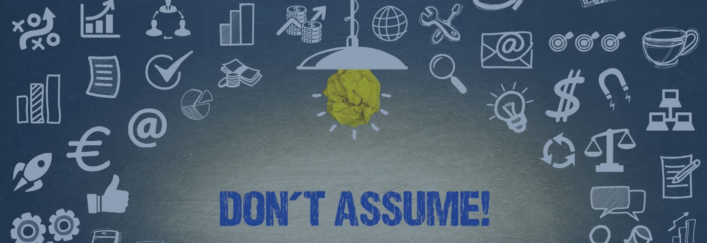 Illustration with lightbulb under a hat surrounded by icons like graphs, money, and email. "DON'T ASSUME!" text at bottom. Tone: thoughtful, cautionary.