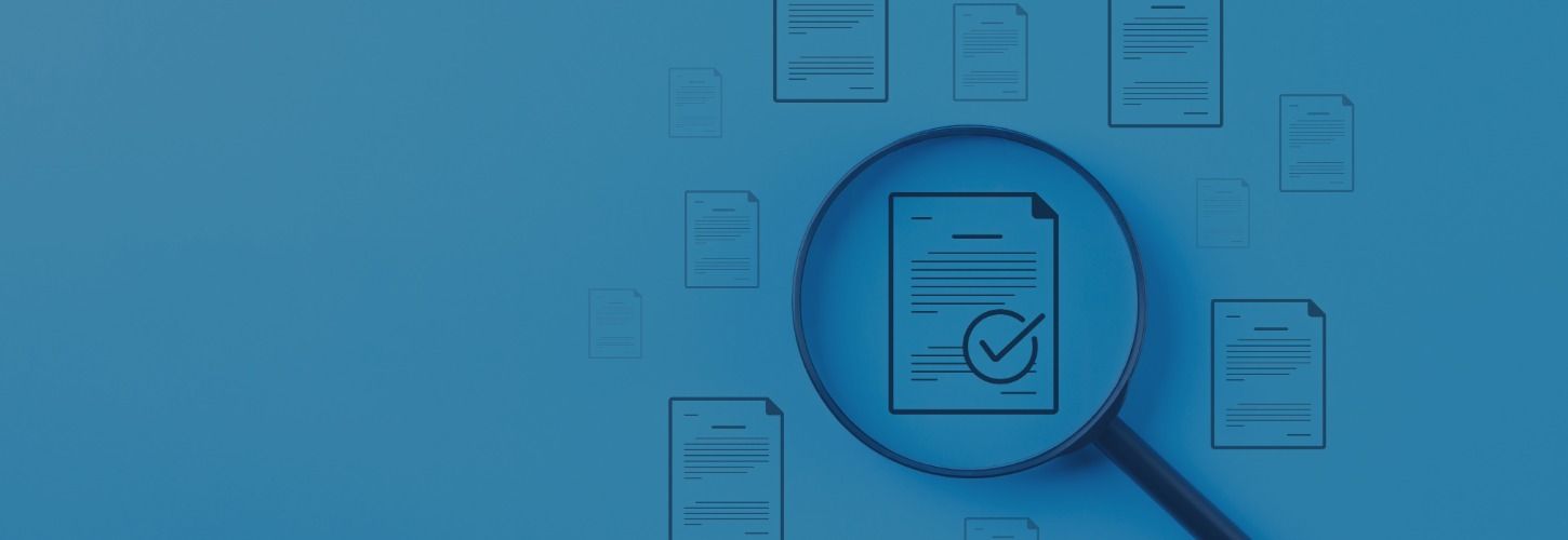 A magnifying glass focusing on a document with a checkmark, surrounded by floating paper icons. The blue background conveys a sense of clarity and analysis.